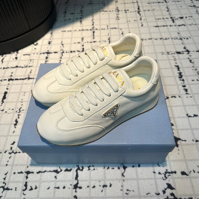 PRA TRIANGLE LOGO SNEAKERS WHITE CALFSKIN