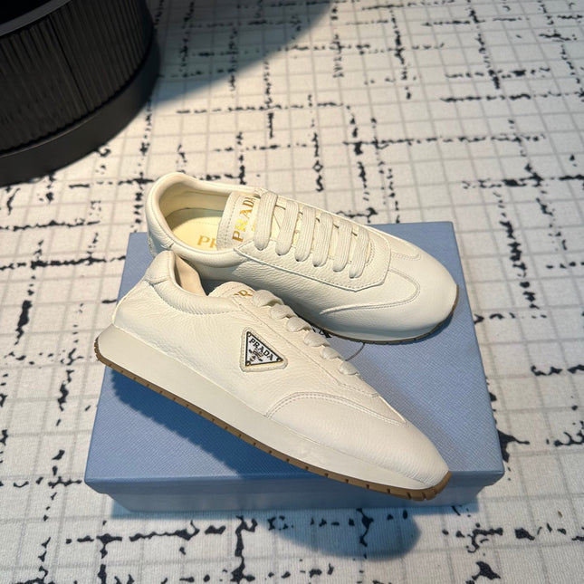 PRA TRIANGLE LOGO SNEAKERS WHITE CALFSKIN