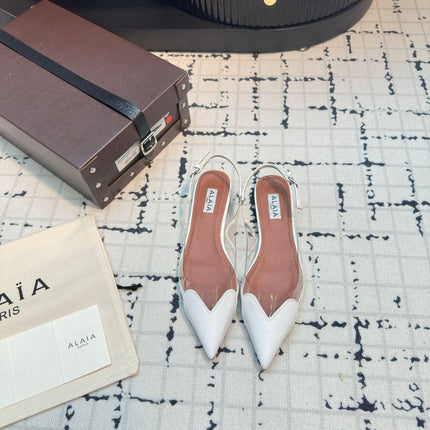 ALAIA FLAT SLINGBACK IN WHITE PATENT CALFSKIN AND FILM
