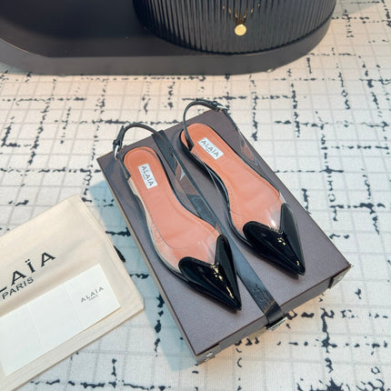 ALAIA FLAT SLINGBACK IN BLACK PATENT CALFSKIN AND FILM