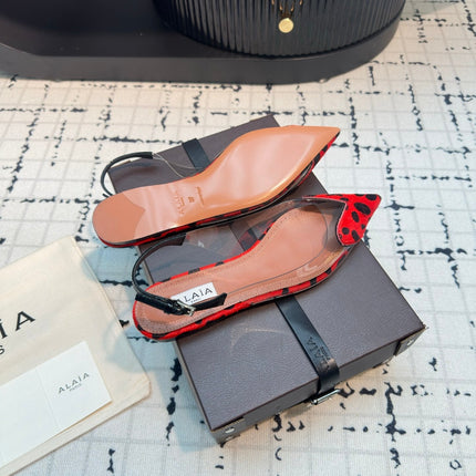 ALAIA FLAT SLINGBACK IN CHERRY RED PATENT CALFSKIN AND FILM