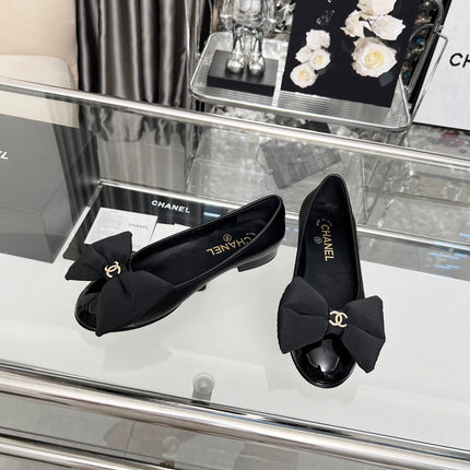 CHANEL 25S ROUND TOE BALLET FLATS WITH A BOW IN BLACK CALFSKIN