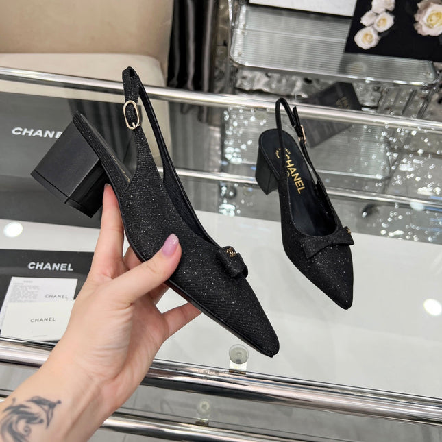 CHANEL 25S SANDALS WITH A BOW 60MM IN SPARKLING BLACK CANVAS