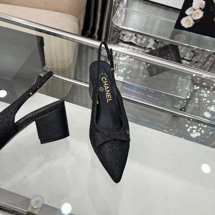 CHANEL 25S SANDALS WITH A BOW 60MM IN SPARKLING BLACK CANVAS