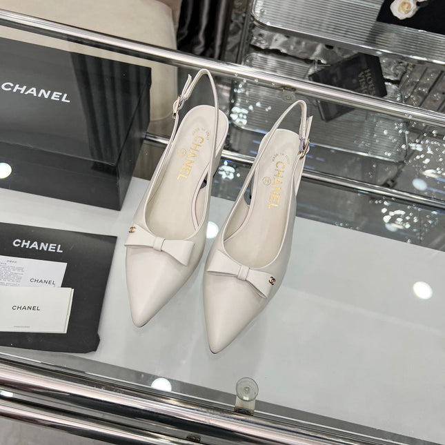 CHANEL 25S SANDALS WITH A BOW 60MM IN WHITE CALFSKIN
