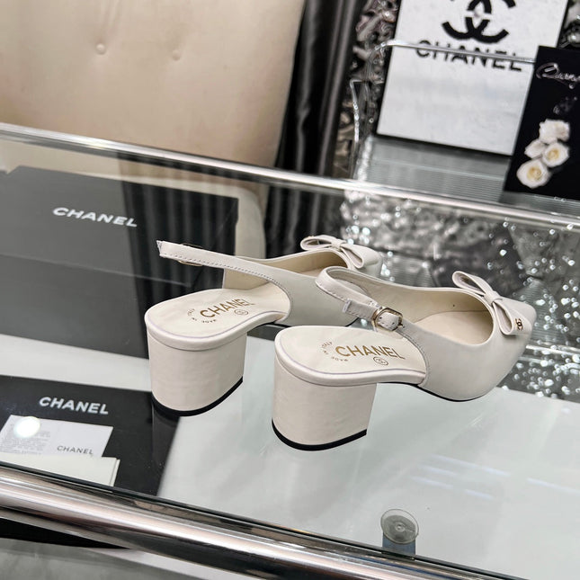 CHANEL 25S SANDALS WITH A BOW 60MM IN WHITE CALFSKIN