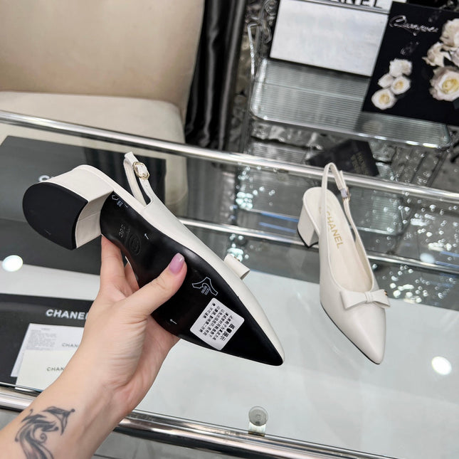 CHANEL 25S SANDALS WITH A BOW 60MM IN WHITE CALFSKIN