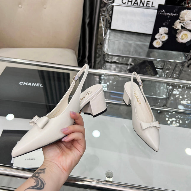 CHANEL 25S SANDALS WITH A BOW 60MM IN WHITE CALFSKIN