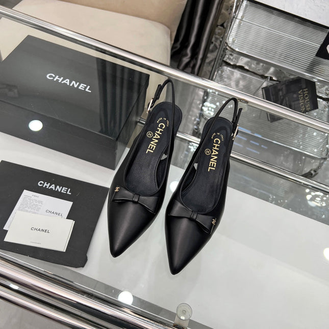 CHANEL 25S SANDALS WITH A BOW 60MM IN BLACK CALFSKIN