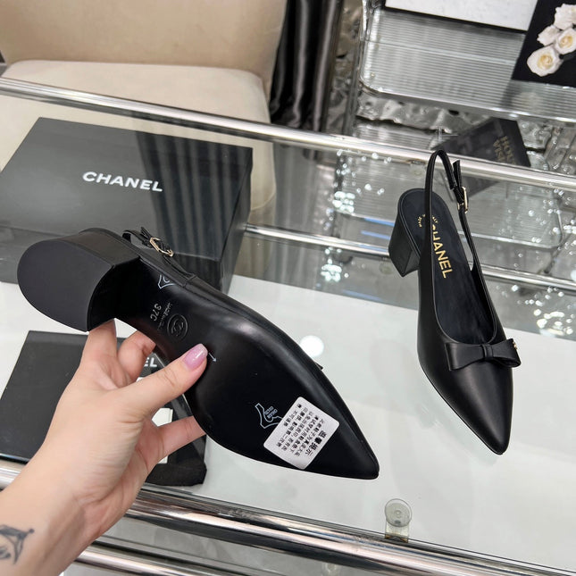 CHANEL 25S SANDALS WITH A BOW 60MM IN BLACK CALFSKIN