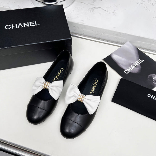CHANEL 25S MARY JANES IN BLACK CALFSKIN WITH WHITE BOW GOLD HARDWRE