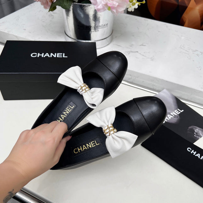 CHANEL 25S MARY JANES IN BLACK CALFSKIN WITH WHITE BOW GOLD HARDWRE