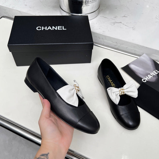 CHANEL 25S MARY JANES IN BLACK CALFSKIN WITH WHITE BOW GOLD HARDWRE