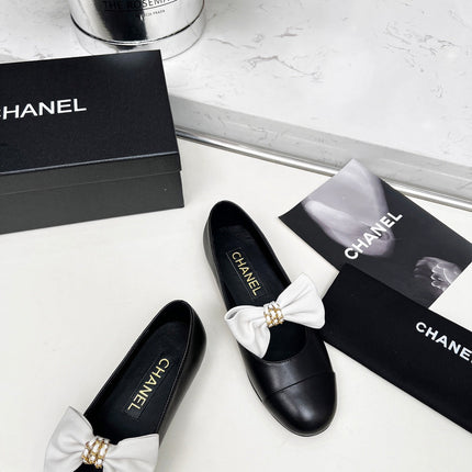 CHANEL 25S MARY JANES IN BLACK CALFSKIN WITH WHITE BOW GOLD HARDWRE