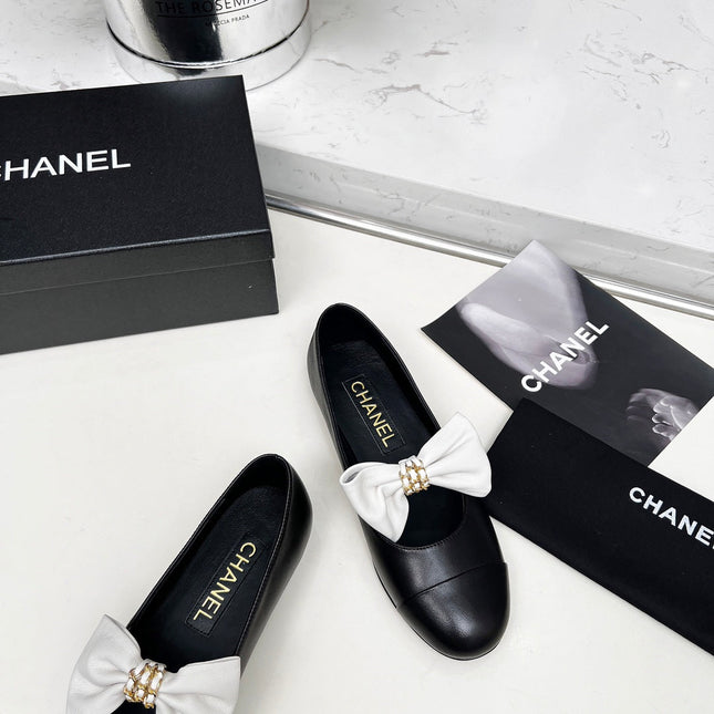 CHANEL 25S MARY JANES IN BLACK CALFSKIN WITH WHITE BOW GOLD HARDWRE