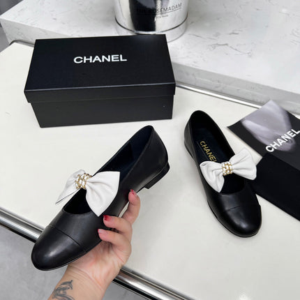CHANEL 25S MARY JANES IN BLACK CALFSKIN WITH WHITE BOW GOLD HARDWRE