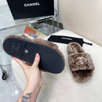 CHANEL 25S FUR SLIPPERS WITH EXPOSED-STITCH STRAPS IN DARK BROWN