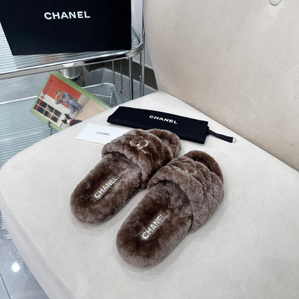 CHANEL 25S FUR SLIPPERS WITH EXPOSED-STITCH STRAPS IN DARK BROWN