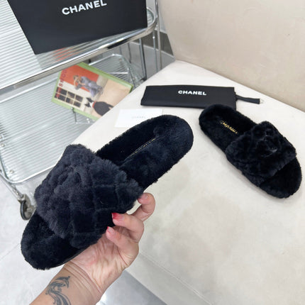 CHANEL 25S FUR SLIPPERS WITH EXPOSED-STITCH STRAPS IN BLACK