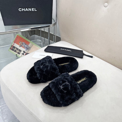 CHANEL 25S FUR SLIPPERS WITH EXPOSED-STITCH STRAPS IN BLACK