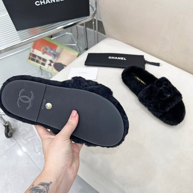 CHANEL 25S FUR SLIPPERS WITH EXPOSED-STITCH STRAPS IN BLACK