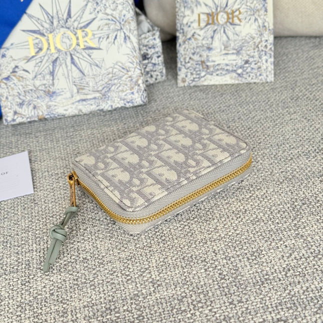 MONTAIGNE VOYAGEUR COIN PURSE 12 IN GREY MONOGRAM OBLIQUE JACQUARD