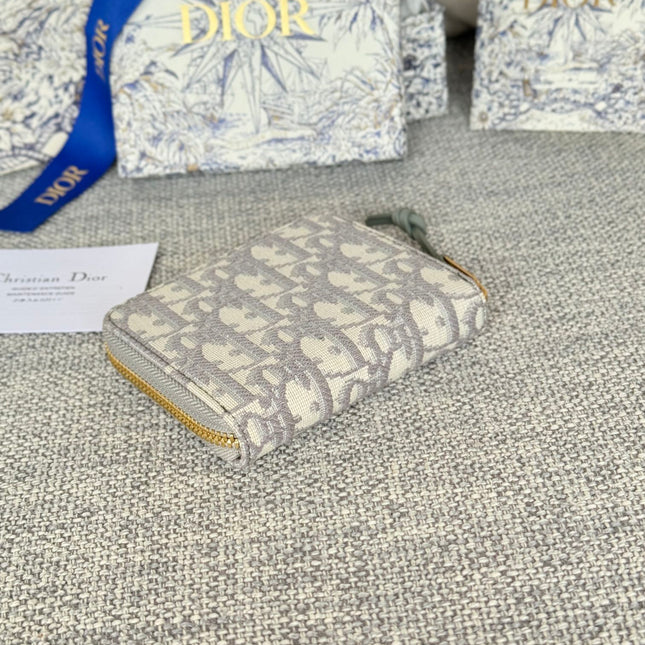 MONTAIGNE VOYAGEUR COIN PURSE 12 IN GREY MONOGRAM OBLIQUE JACQUARD