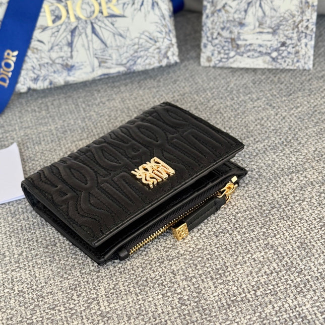 BIFOLD WALLET 11 IN BLACK QUILTED ALLOVER CALFSKIN