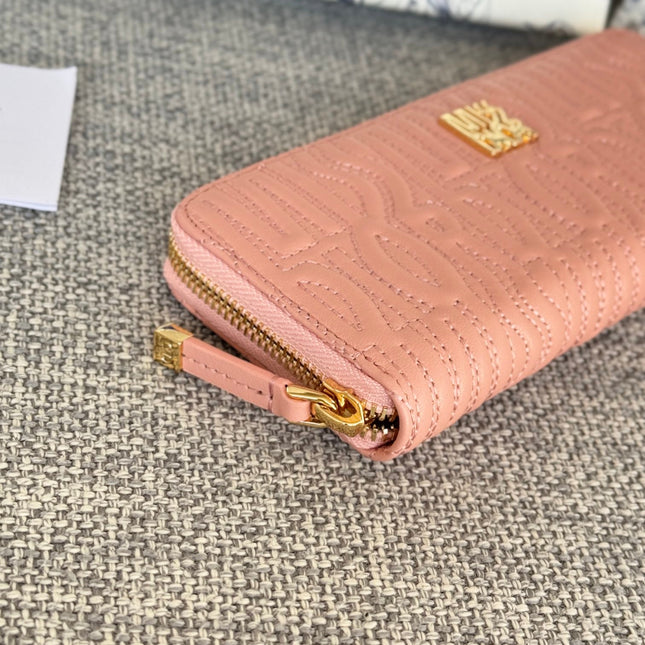 VERTICAL LONG ZIP WALLET 20 IN BABY PINK QUILTED ALLOVER CALFSKIN
