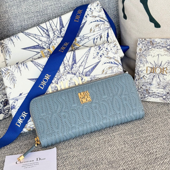 VERTICAL LONG ZIP WALLET 20 IN BABY BLUE QUILTED ALLOVER CALFSKIN