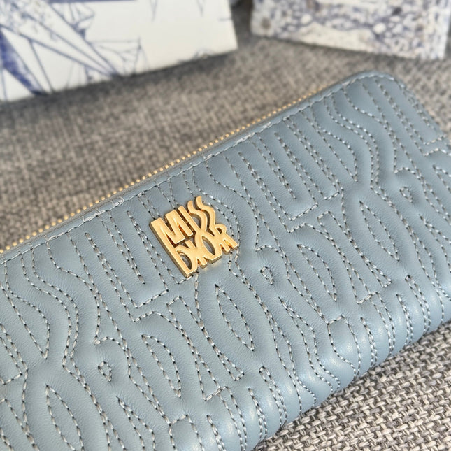 VERTICAL LONG ZIP WALLET 20 IN BABY BLUE QUILTED ALLOVER CALFSKIN