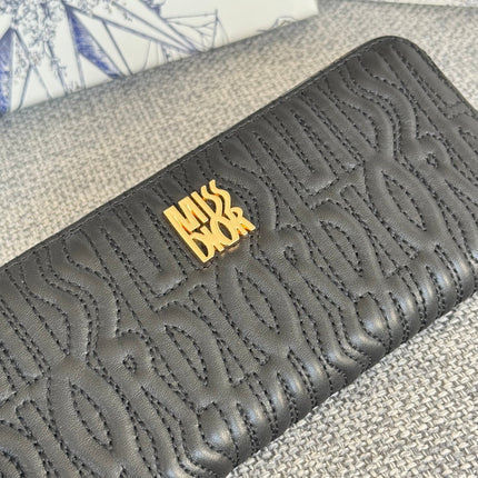 VERTICAL LONG ZIP WALLET 20 IN BLACK QUILTED ALLOVER CALFSKIN
