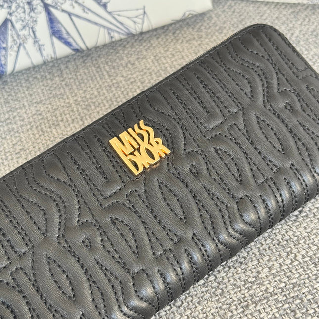 VERTICAL LONG ZIP WALLET 20 IN BLACK QUILTED ALLOVER CALFSKIN