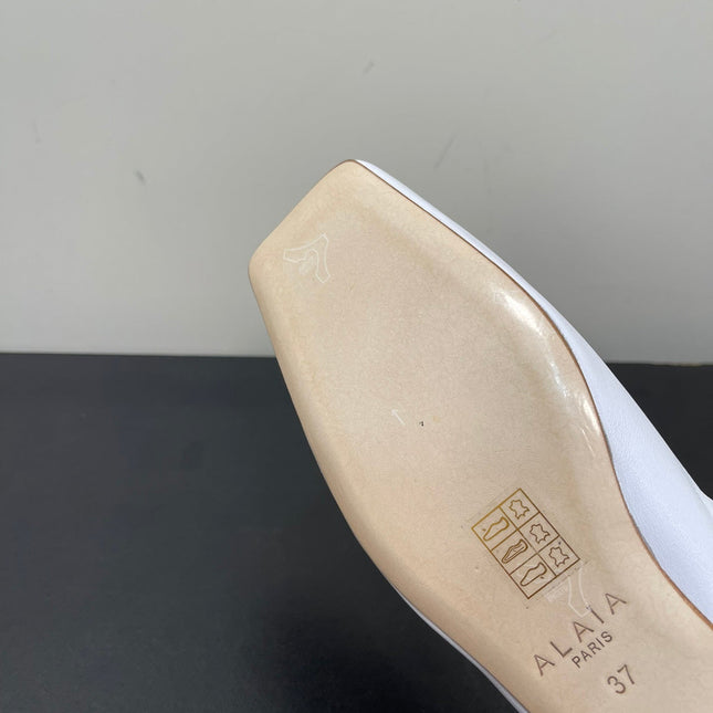 ALAIA BALLET FLATS IN WHITE SMOOTH CALFSKIN