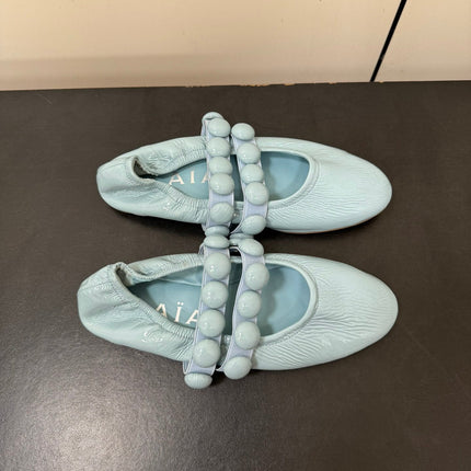 ALAIA SPHERE BALLET FLATS IN LIGHT BLUE LAMBSKIN