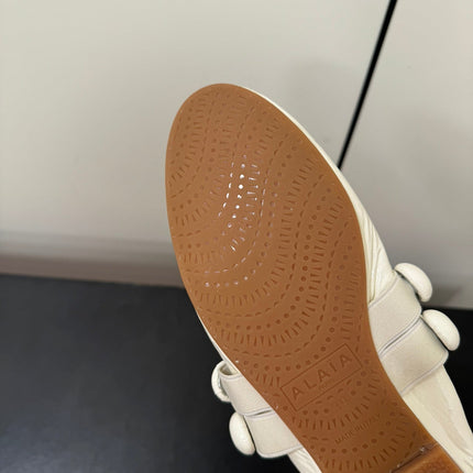 ALAIA SPHERE BALLET FLATS IN WHITE LAMBSKIN
