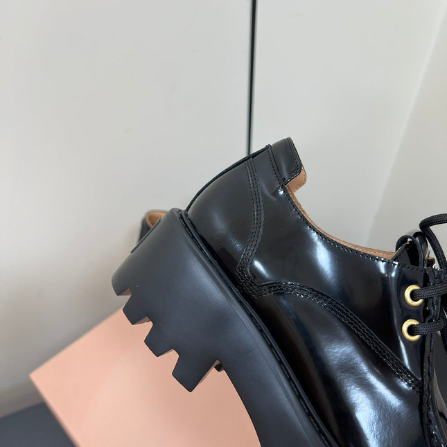 LACE-UP LOAFERS WITH THICK SOLE IN BLACK SHINY SHEEPSKIN