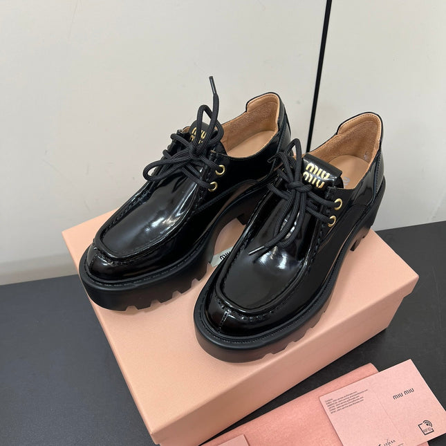LACE-UP LOAFERS WITH THICK SOLE IN BLACK SHINY SHEEPSKIN