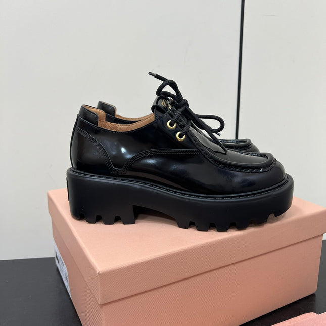 LACE-UP LOAFERS WITH THICK SOLE IN BLACK SHINY SHEEPSKIN