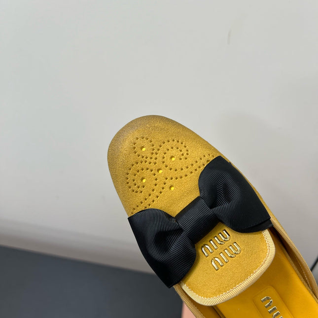BOW MULES IN DUST YELLOW SUEDE