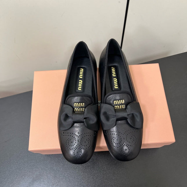 LOAFERS WITH BOW IN BLACK SHEEPSKIN