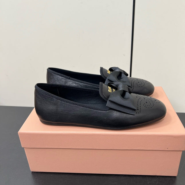 LOAFERS WITH BOW IN BLACK SHEEPSKIN