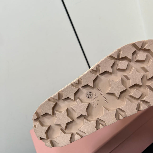 MULES SLIPPERS IN BEIGE SUEDE WITH GOLD COIN