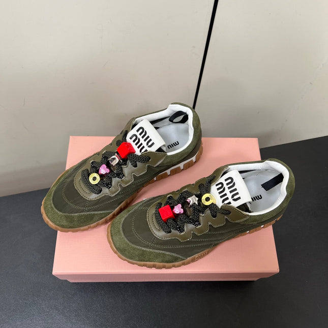 TYRE SNEAKERS IN DARK GREEN TECHNICAL FABRIC AND SUEDE WITH STICKER