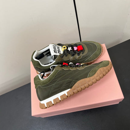 TYRE SNEAKERS IN DARK GREEN TECHNICAL FABRIC AND SUEDE WITH STICKER