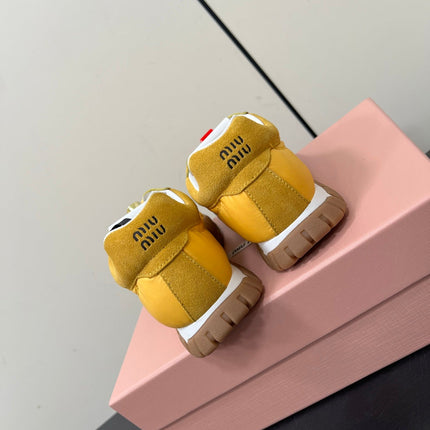 TYRE SNEAKERS IN YELLOW TECHNICAL FABRIC AND SUEDE WITH STICKER