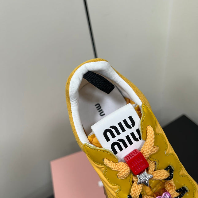 TYRE SNEAKERS IN YELLOW TECHNICAL FABRIC AND SUEDE WITH STICKER