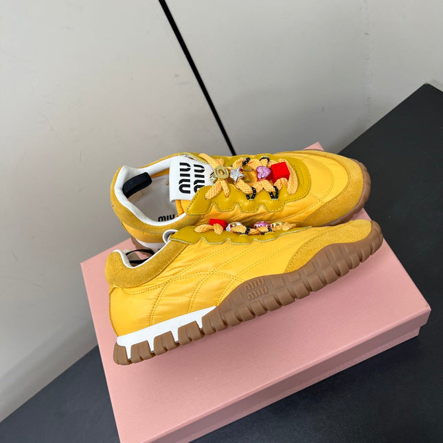 TYRE SNEAKERS IN YELLOW TECHNICAL FABRIC AND SUEDE WITH STICKER
