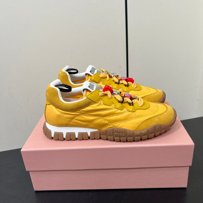 TYRE SNEAKERS IN YELLOW TECHNICAL FABRIC AND SUEDE WITH STICKER