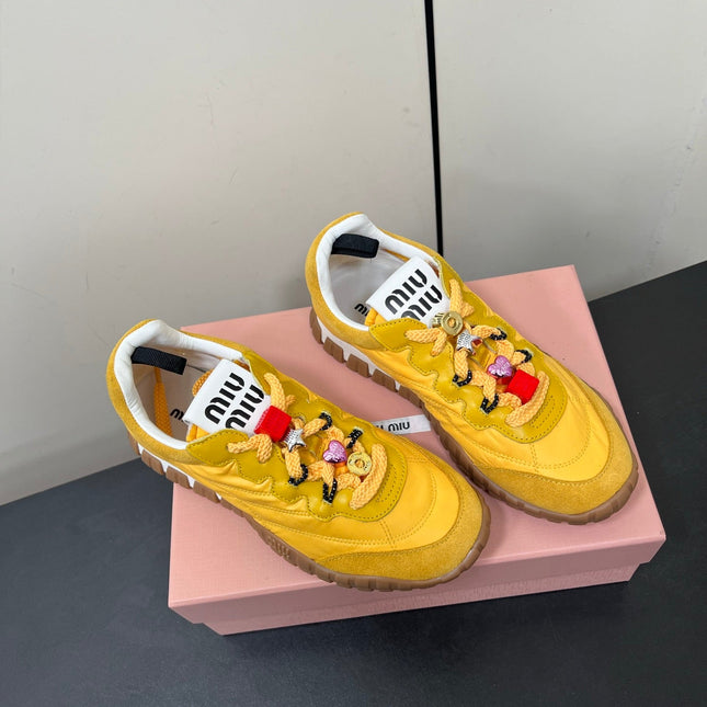 TYRE SNEAKERS IN YELLOW TECHNICAL FABRIC AND SUEDE WITH STICKER